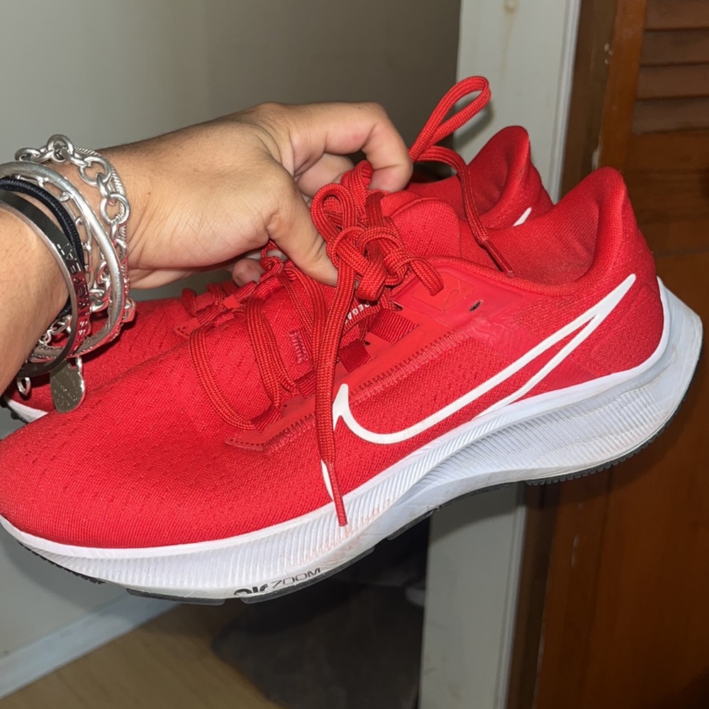 Nike red running shoes